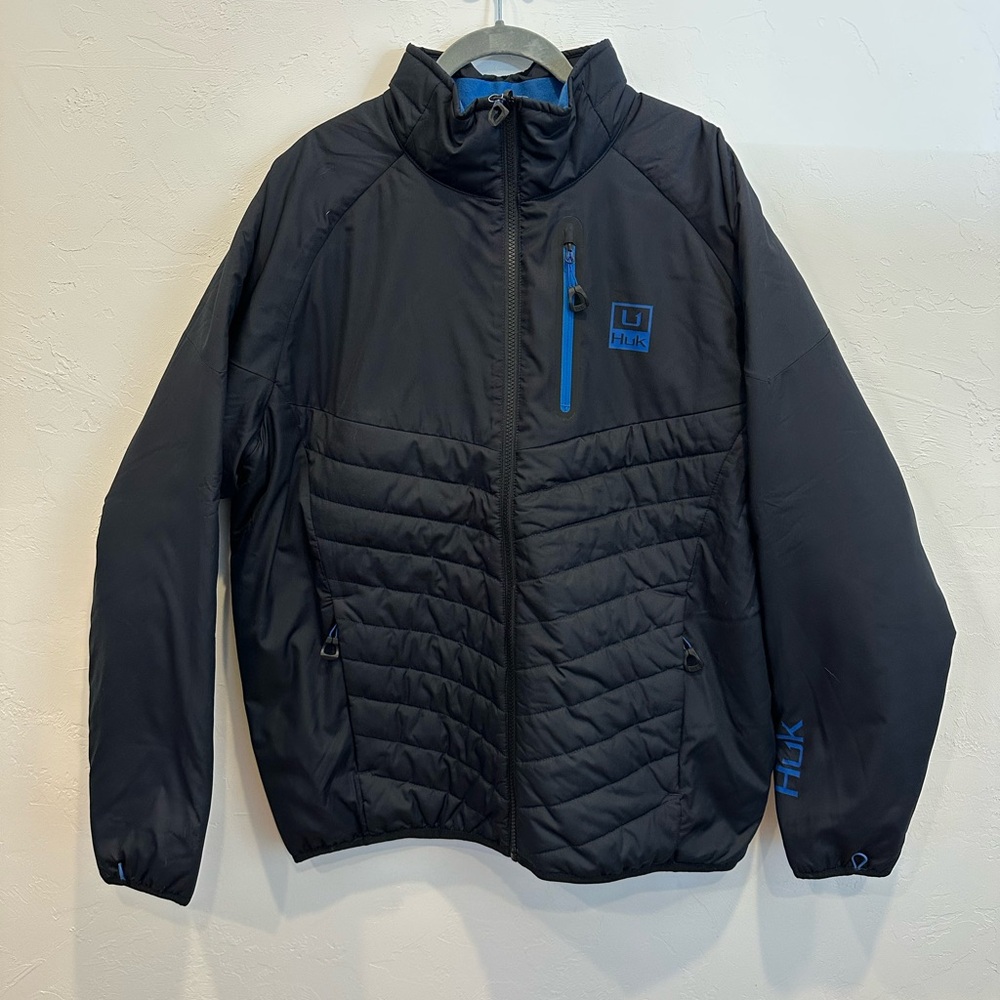 Huk Black Jacket with Vibrant Blue Accents